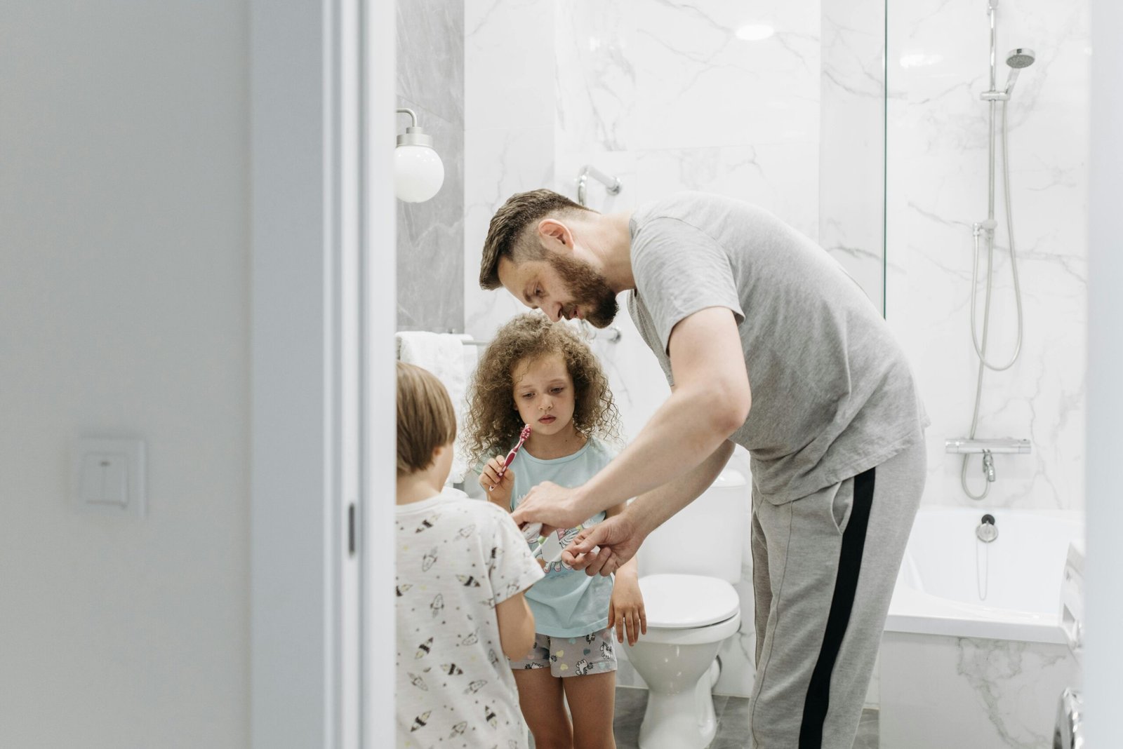 A parent and toddler following a consistent morning routine together